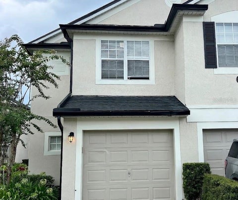 Photo of 6058 Twain Street #101, Orlando, FL 32835 (MLS # O6415953)