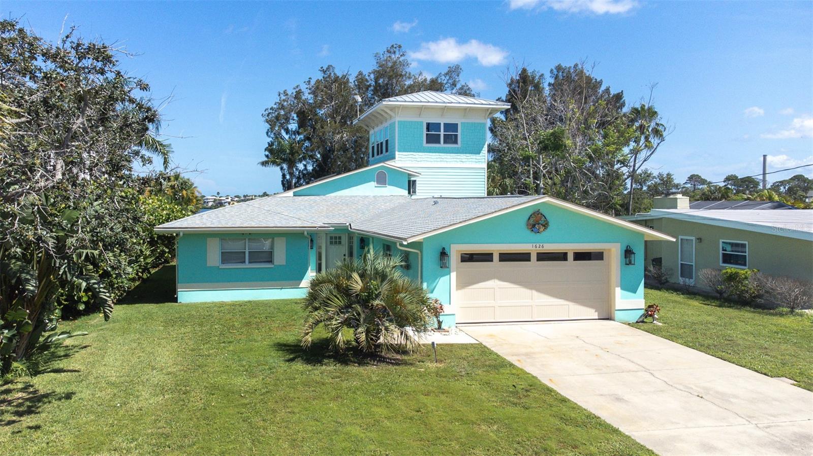 OFFERING this CUSTOM three story waterfront home, on the Gulf of America.
Large front yard leading to this incredible home with all the amenities for enjoying the Florida lifestyle.
The first floor includes the attached two car garage (brand new hurricane “smart” garage door with opener and camera) which enters into the laundry and kitchen areas. The laundry has custom cabinetry and granite countertops with sink. All new ceramic flooring throughout the home takes you into a custom-built kitchen, which includes the cabinetry, quartz countertops, custom hood and Café Designer Appliances.
Continuing from the kitchen to the dining area and living room to the view through the pool area to the gulf and boat dock.
Out of the elements is a 7’x15’ fiberglass pool and area within the home. Above the pool room is a loft for additional storage, office or guests. A fantastic place to enjoy the “privacy” of an enclosed indoor pool, or a choice to open the sliding 9 panes of hurricane sliding doors to have an open view of the gulf.
The master bedroom has a waterfront view and contains a new walk-in closet and master bath completely remodeled. Around the corner is the second bedroom and second bathroom, updated in 2021.
The next level, accessed by a stairway, leads you to the third bedroom.
A recently added third floor is the ultimate entertaining room with panoramic water view, walk out observation deck and hurricane windows. Currently is set up with a bar and gaming table.
Pay attention to ALL the custom details on your way through the house, such as the exotic canary wood windowsills.
On entry to the dock is a 24’x14’ custom deck surrounding two majestic Australian Pines. Great for relaxation and watching the amazing gulf sunsets.
Custom 8000 lb. boat lift installed in 2021 and NEW marine grade, maintenance free “wear decking”. The dock also contains custom lighting and an outdoor” manatee” shower. It is approximately a 15-minute boating experience to the Anclote sandbar and channel.
As an added area for outdoor enjoyment is a firepit entertainment area at waterfront. Newly installed, Hurricane Rated "Smart" garage door.
You can boat to Captain Jacks, downtown Tarpon Springs Sponge Docks, Rusty Bellies, Miss Vicki’s, and Ozona Blue, to name a few. It is also a short boat or bike ride to Howard Park. For your RV or guests, the driveway has a 50 amp hook up and sufficient depth for a 40 ft coach.
This is truly THE property to enjoy the Florida lifestyle!
