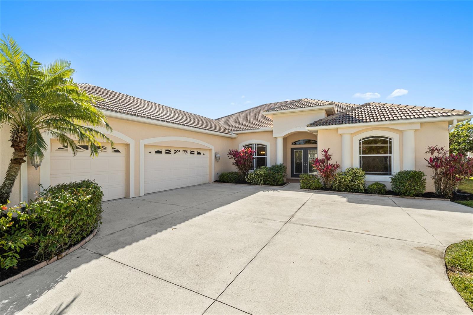 Welcome to the vibrant, wholesome community of Greyhawk Landing. This Sam Rodgers Siesta II home offers a Florida lifestyle that is just hard to beat! As you walk in, you are greeted by 12” ceilings and wood-look tile throughout. An open floor plan makes this space great for entertaining. Pocket sliders bring the outside in and give you a breathtaking lake and preserve view with plenty of wildlife. Do you like to cook? The gourmet kitchen with 42” lighted, raised panel wood cabinetry with pullouts, solid surface countertops, a built-in convection oven, and a cooktop with a vent hood will delight any chef or party host! The split floor plan gives way to the master suite, which can be closed off and has a private entry from the spacious lanai, two large closets, dual vanities, and a relaxing walk-in shower. Step onto your lanai and you are greeted by a gorgeous pool and spa. With plenty of outdoor space to relax, entertain, or just take a swim! A convenient cabana-style shower with hot water is just one more detail this spectacular home has The AC was replaced in 2021. A tile roof and three-car side load garage complete the comforts this home has. Greyhawk Landing’s many amenities include a lagoon-style swimming pool with waterslides, fitness center, lighted tennis and basketball courts, soccer and softball fields, a playground, a fishing dock, and 2 miles of nature trails for walking or biking. There is also a full calendar of community activities and events. Greyhawk Landing, located between SR-64 and Upper Manatee River Rd. near Lakewood Ranch, offers easy access to championship golf courses, shopping, dining, top-rated schools, and I-75 to make an easy commute to Sarasota, Bradenton, Tampa, and nearby Ellenton Premium Outlets. Book a showing today! Is this home your perfect match?