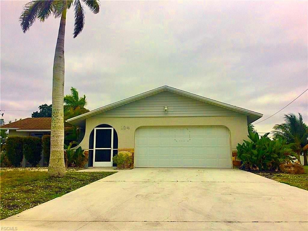 Photo of 124 SE 31st Street, Cape Coral, FL 33904 (MLS # C7525530)