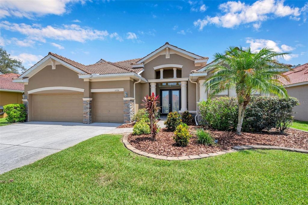 Photo of 11726 Belle Haven Drive, New Port Richey, FL 34654 (MLS # W7876271)