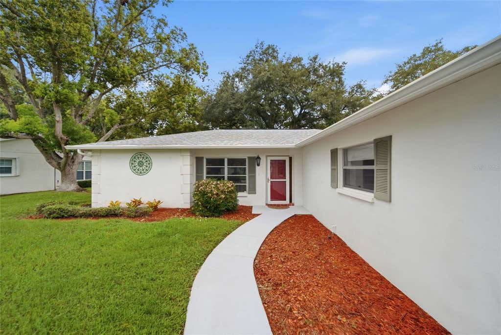 Photo of 8405 Divot Way, Port Richey, FL 34668 (MLS # TB8536090)