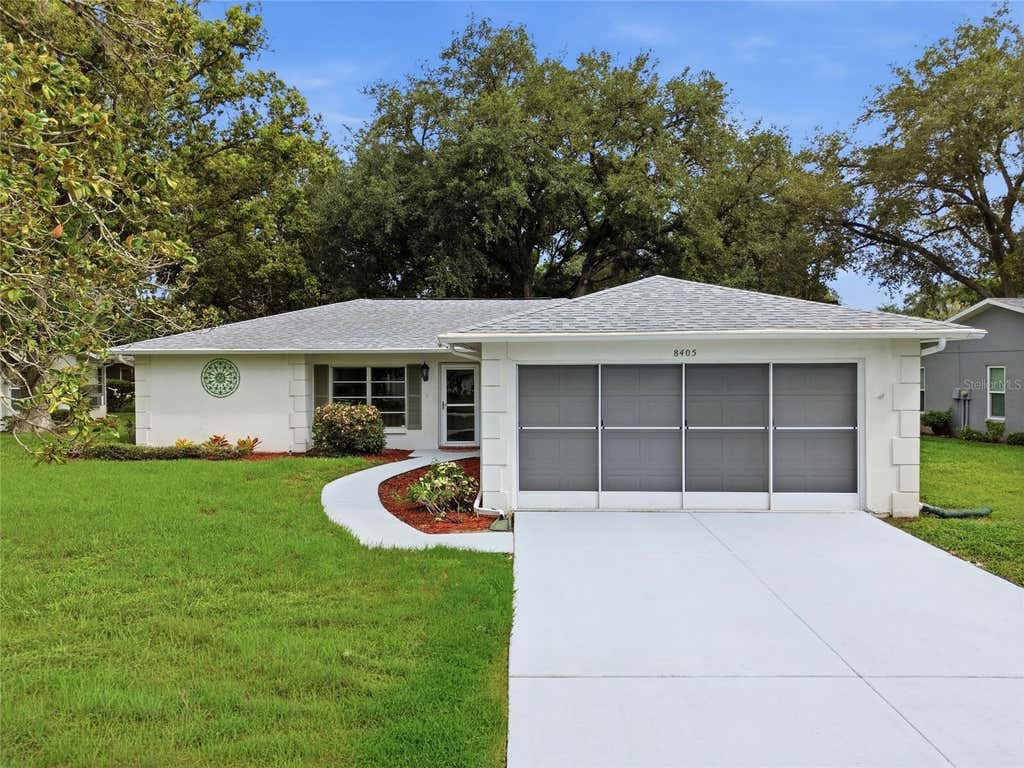 Photo of 8405 Divot Way, Port Richey, FL 34668 (MLS # TB8536090)
