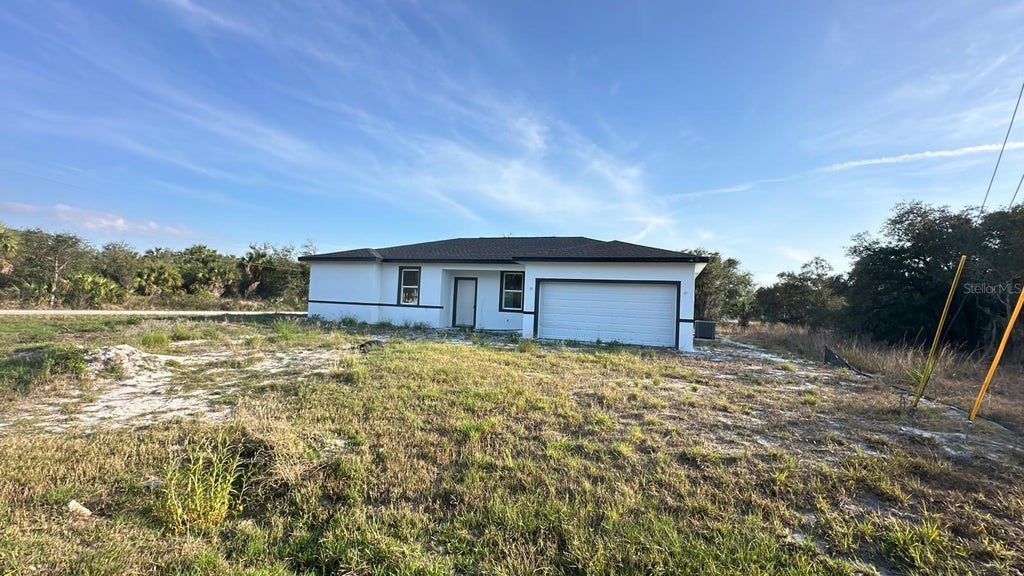 Photo of 19233 Wilton Avenue, Port Charlotte, FL 33954 (MLS # TB8561869)