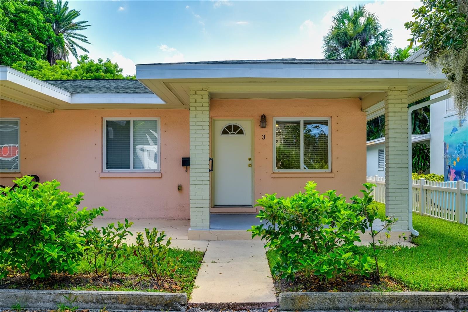Beautifully Updated Triplex Unit — Steps from Clearwater Bay! Live surrounded by grand historic estates in the Harbor Oaks neighborhood—without the million-dollar price tag. This private-entry unit in a charming triplex features a newly added primary suite with en-suite bath, oversized closets, and direct access to a backyard paver patio retreat. Enjoy peek-a-boo bay views from your private front porch, plus the convenience of an assigned parking space directly at your door. Small pets welcome with deposit. Shared laundry on-site. Coastal charm. Luxury location. Residential feel. All at a rental price you can love.