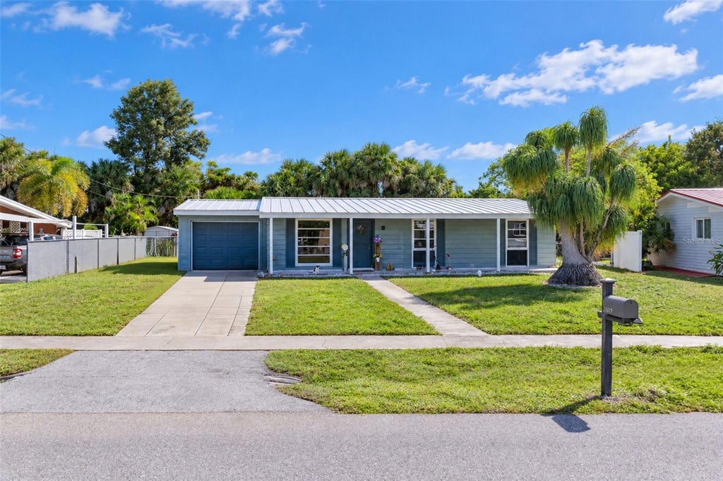 Photo of 21307 Austin Avenue, Port Charlotte, FL 33952 (MLS # C7532469)