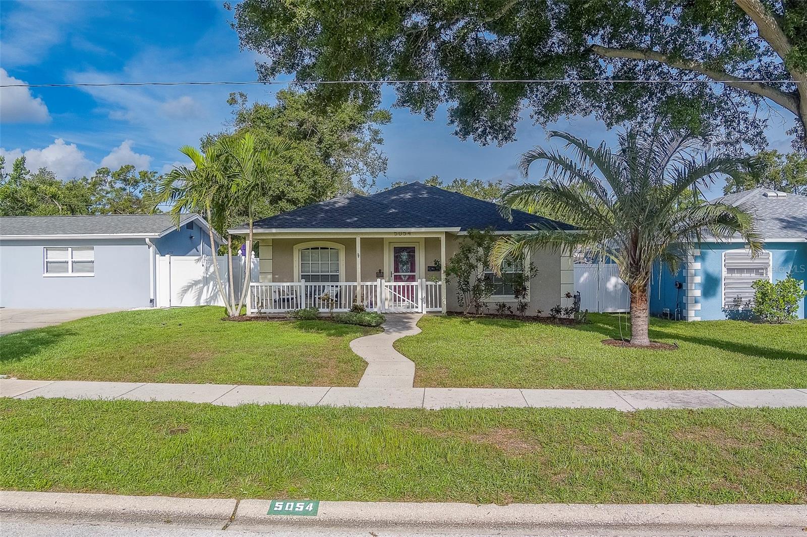Welcome to this beautifully maintained 3 bedroom, 2 bathroom home located in the heart of Central St. Petersburg! Built in 2002, this pristine property offers a modern layout with timeless features, including gleaming hardwood floors, soaring volume ceilings, and a bright, open floor plan that’s perfect for both relaxing and entertaining. The thoughtfully designed split-bedroom layout provides added privacy, while the updated kitchen offers newer appliances and plenty of space for meal prep and storage. A spacious inside laundry room adds to the home's convenience. Step outside to your fully fenced backyard — ideal for pets and outdoor enjoyment — and enjoy the ease of alley access to a 2-car garage with an electronic gate. Sip your morning coffee on the inviting front porch and take in the peaceful neighborhood vibe. Pet-friendly and move-in ready, this home includes lawn care and electric in the monthly rent, offering exceptional value. Located just minutes from vibrant downtown St. Petersburg, shopping, dining, and the world-renowned Gulf Beaches, this location can’t be beat. Don’t miss out – schedule your tour today and make this beautiful house your next home!