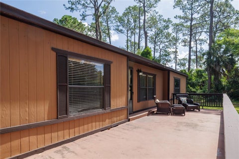 Photo of 557 Newton Road, Port Orange, FL 32127 (MLS # NS1088497)
