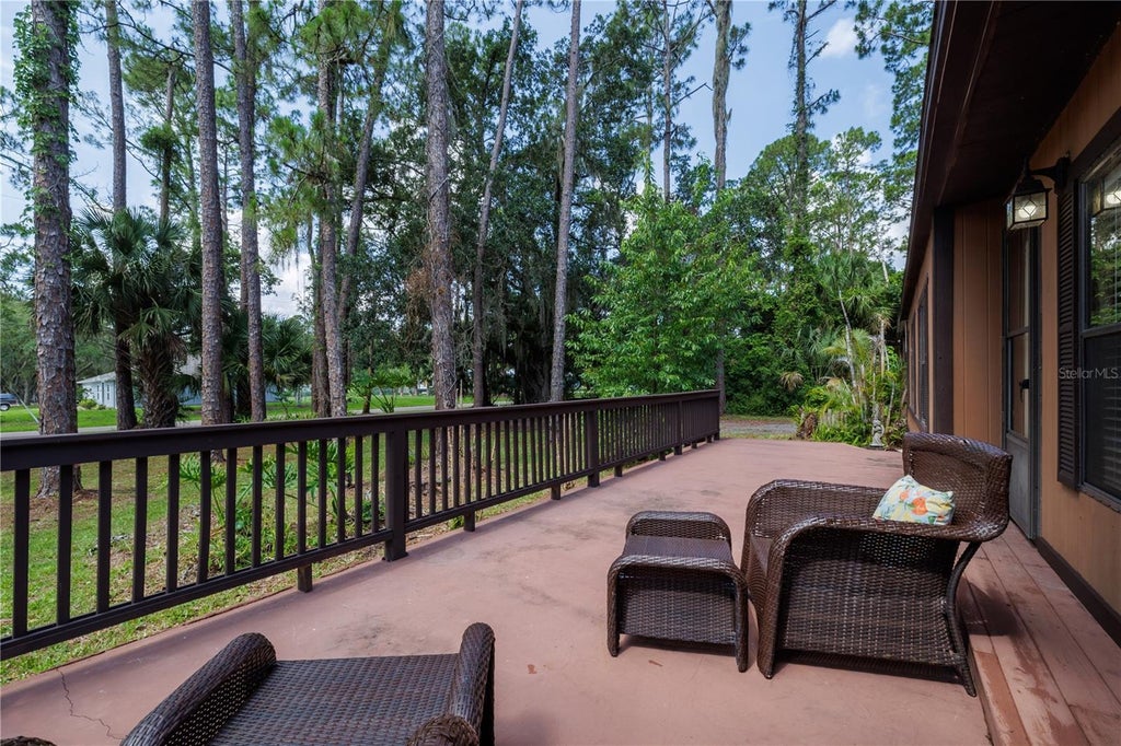 Photo of 557 Newton Road, Port Orange, FL 32127 (MLS # NS1088497)