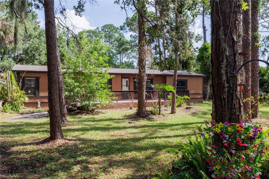 Photo of 557 Newton Road, Port Orange, FL 32127 (MLS # NS1088497)