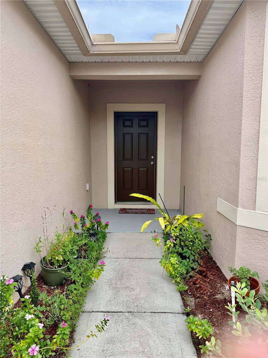 Photo of 196 Tracy Court E, Haines City, FL 33844 (MLS # O6422721)