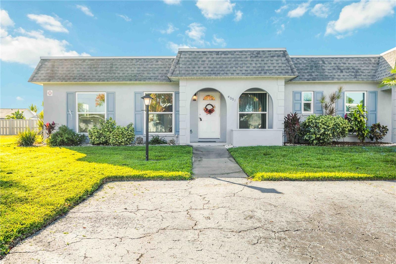 Beautifully maintained 2-bedroom, 2-bath end-unit villa in the highly desirable 55+ community of Cortez Villas! This bright and spacious home features an open living and dining area, a versatile den or office, and a spotless kitchen with abundant cabinet space. Enjoy morning coffee or evening relaxation in the enclosed lanai overlooking a peaceful green space. With parking right at your door and access to resort-style amenities including a heated pool, clubhouse, and shuffleboard, this home offers the perfect blend of comfort and convenience. Ideally located near shopping, dining, and just minutes to the Gulf beaches, this villa delivers the best of the Florida lifestyle in one of Bradenton’s most sought-after communities.