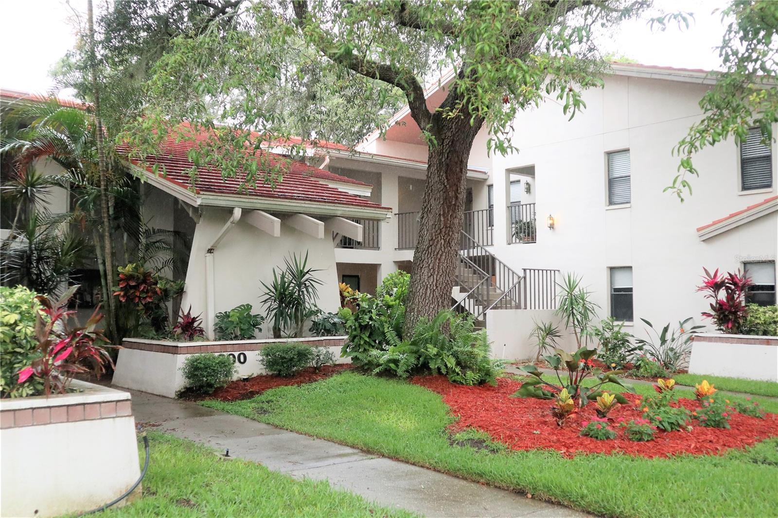 Beautiful Sunset Shores 2/2 Condo!! Community located on the Gulf of Mexico embraces the Florida lifestyle. Ground floor unit just off the courtyard with its lush and mature landscaping that can be seen from your foyer. Wander into your galley style kitchen with tons of cabinetry and granite counters, breathe in the beautiful view of your backyard as you prepare the evening meals. Additional storage available in the closet pantry. Take advantage of the pass-through window for those evening snacks while enjoying a show or movie in the living room. Master suite is spacious with its own walk in closet, bathroom and private lanai entrance that overlooks the secluded tennis courts. Remaining bedroom is as spacious and share a hallway bathroom. Washer and dryer hookups available. Enjoy summer dips in the pool, a vigorous work out, activities in the club house, or a round of tennis. Walk from your new home to the community dock in the evenings to watch beautiful Florida sunsets on the Gulf of Mexico. You're only a few blocks to Sunset Park and less than a mile to Howard Park. This waterfront community has it all and this condo deserves to be at the top of your list. In addition to the advertised base rent, all residents are enrolled in the Resident Benefits Package (RBP) for $50.00/month which includes HVAC air filter delivery, credit building to help boost your credit score with timely rent payments, utility concierge service making utility connection a breeze during your move-in, and much more! More details upon application. Sorry, no pets allowed. Occupied, available 08/24/2025!