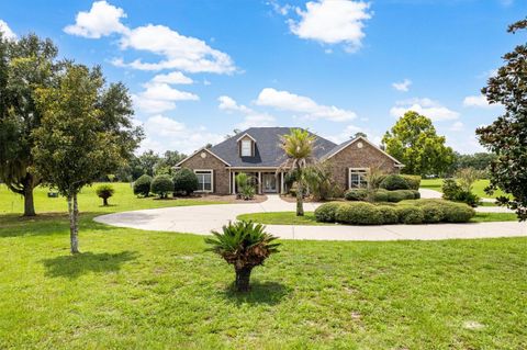 Photo of 8045 SW 135th Lane, Archer, FL 32618 (MLS # GC533351) Photo of 8045 SW 135th Lane, Archer, FL 32618 (MLS # GC533351)