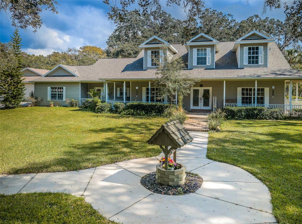 NEW ROOF on This exceptional gated Equestrian Estate located in Osceola Equestrian Station in New Port Richey, Florida. Pristinely manicured 14.15 acres with 100 year old grandfather oak trees surrounded by conservation includes a single family home with 2 1/2 car garage, detached 4 bay garage, 5280 SF show barn, 2256 SF workshop and 2 income producing apartments. The spacious fully functional barn includes 15 stalls, 3 of them large foaling stalls with in/outs, therapeutic mats, commercial ceiling fans, automatic waters, cameras in each stall and a Shoo-fly system, 2 wash racks with hot/cold water and 2 dry racks. All this is adjacent to 3 board-fenced grassy paddocks, fully irrigated, with separating lanes. Climate controlled tack and feed rooms and a full size bathroom to meet your needs. Hurricane shutters and automatic hurricane front door along with a GENERAX GENERATOR to protect your investments in inclement weather. Double Dutch doors lead outside and provide a second emergency exit. The clay/sand arena just outside of the barn is fully enclosed for safety and has sprinklers for watering. Also has an oversized round pen and a 2-stall miniature barn. The stunning custom built home includes 4 bedrooms, 3 baths and overlooks the barn and lane approaching the property. It features French doors opening onto a wrap around porch from 4 exterior rooms. Greeted by double doors the interior is an open design with a 2-story foyer that features the "country look". The chef's kitchen is complimented by stainless steel appliances, solid wood cabinetry, granite counter tops with an oversized island. Perfect for entertaining and large family gatherings. The great room has a stone fireplace the room opens onto a back patio overlooking a park-like setting. On the first floor is the master bedroom and ensuite bath with shower and jacuzzi tub, separate wash basins and 2 spacious walk-in closets. The flooring throughout the main living area is a ceramic tile with a wood grain look for easy cleaning. An additional large second floor loft is fully carpeted with a custom wood stair way. The loft on the second level, with diversity as a home gym or man cave, has a full bathroom. The 4-bay spacious detached garage is connected by a covered breezeway and includes 1 enclosed air conditioned bay that used mainly for hay storage. Attic space is accessible for additional storage. Located beyond the house is a workshop with 3 bays including drop down doors with an attached 24x70 trailer/carport storage space. All these amenities and still centrally located to top rated beaches, theme parks, fairgrounds, and the up and coming "World Equestrian Center" located in Ocala, Fl. Only 10 minutes to the Suncoast Pkwy. This is a one of a kind horse lovers dream! CAN ALSO BE A LUCRATIVE INCOME-PRODUCING OPPORTUNITY! (BUILDING SIZES, approx.: SFH 3300 heated SF; Barn 5280SF; Workshop 2256SF; 4-Bay Garage 2304SF; Trailer/Carport 1680SF; Apt A 840 heated SF; Apt B 544 heated SF) www.10836ThoroughbredLn.com
***EXTRA FEATURE Available now, two 5 acre lots with water, electric and fencing. These can be purchase separately or together for an additional price .