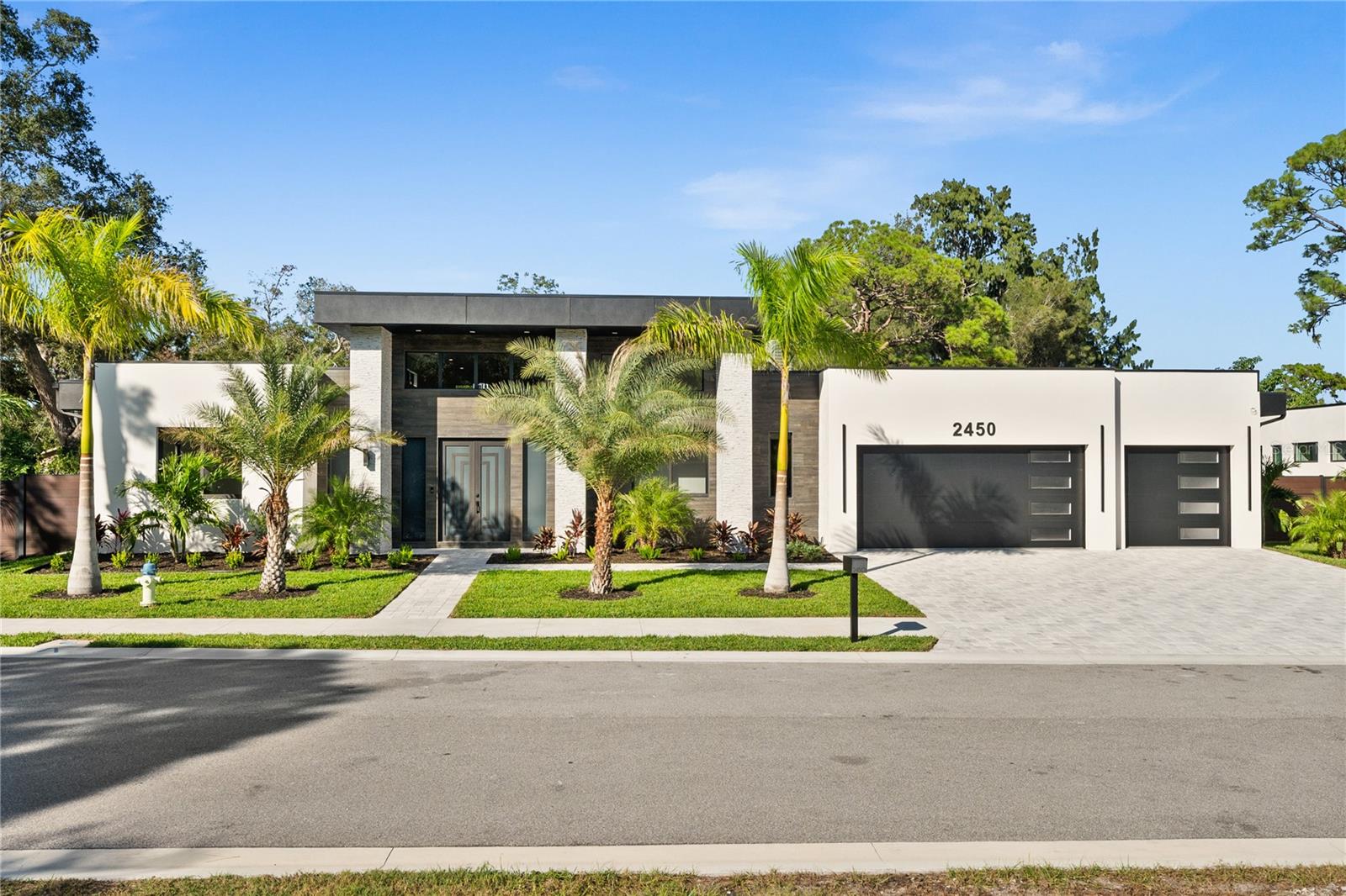 Just minutes away from the beautiful sands of Siesta Key Beach, this is your perfect getaway for a blend of comfort and elegance. Experience unparalleled luxury living in this magnificent BRAND NEW home nestled in the heart of Sarasota. Boasting exquisite design and unparalleled craftsmanship, this residence offers a seamless blend of modern sophistication and tropical elegance.
Spanning across an expansive floor plan, this stunning home features spacious living areas adorned with high ceilings, sleek finishes, and large windows that flood the interiors with natural light. The gourmet kitchen is a culinary masterpiece, equipped with top-of-the-line appliances (Thermador), custom cabinetry, and a waterfall island (with additional storage underneath) perfect for both casual dining and entertaining. Matching accent wall complete the look.
Step outside to discover your own private oasis. The meticulously landscaped grounds encompass lush greenery, a sparkling heated saltwater pool, a relaxing spa, and ample space for outdoor gatherings. The outdoor bar and lounge area create an ideal setting for hosting guests or enjoying tranquil evenings under the stars.
Luxuriate in the lavish master suite complete with a spa-like en-suite bathroom and sliding doors offering breathtaking views. Additional bedrooms and versatile spaces cater to various needs, providing ample room for family, guests, or a home office. Each bedroom has it's own walk-in closet and bathroom.
Located in a community with new construction million-dollar homes. Shoreline has Phillippi Creek access and COMMUNITY DOCK for fishing, kayaking, nature watching or simply relaxing.
It offers proximity to Sarasota's finest amenities, including pristine beaches, upscale shopping, gourmet dining, cultural venues, and recreational activities. Embrace the epitome of Florida luxury living in this remarkable residence. *** Make sure you see the Virtual Tour