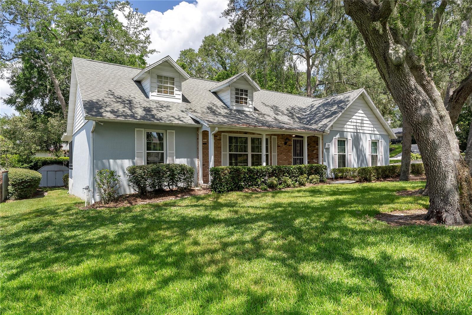 Welcome home to 2209 Dogwood Circle located in the stunning neighborhood of Dogwood Mountain. Located just right near downtown Mount Dora, this home offers convivence to town yet a serene setting of birds chirping and majestic oaks. Upon entering the home, you will love to large formal living room which is great for entertaining. The kitchen overlooks the family room with fireplace as well as leads to the formal dining area. The primary suite features a walk in closet, glass shower and door leading to the back porch. Bedrooms 2 and 3 are both a nice size and share a bathroom that has a tub/shower combo. Enjoy the evenings on your oversized screened in back porch. As mentioned before, this location is just minutes to both downtown Mount Dora shopping, restaurants, activities and more but also just a mile to Lowes, Publix and so much more. This is a home you will want to see quickly! It will not last long.
