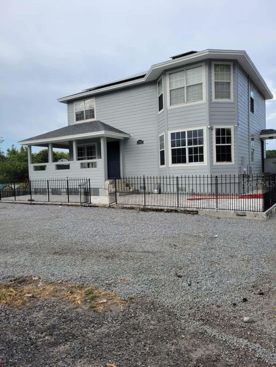 Beautiful property located in Polk city. A quiet and cozy place that features 5 acres (completely fenced). There is enough space for animals! Thereare chicken coops in perfect condition, with different divisions. This property is on two floors and measures 1,828 sq ft. It has three bedroomsand two and a half bathrooms. Also features a very large bonus/game room on the first floor. Home has been recently painted and with the newroof (2021) and Air-conditioning (2020; with 10-year warranty). This house is completely furnished with solar panels throughout the entirehouse!! You can relax outside on its large terrace and monitor the entire property. Great location to visit all of parks in Orlando (Just 17 minutesfrom World Disney world). Make your appointment today!!! Thank you!!!!