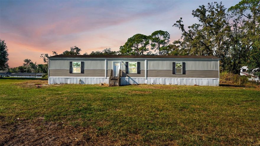 One or more photo(s) has been virtually staged. Welcome to this 2021 mobile home offering modern comfort, privacy, and room to grow. Situated on just under one acre with no HOA, this property provides the freedom and space you've been searching for! Inside, you will find three spacious bedrooms and two full bathrooms, along with a large, open kitchen designed for both everyday living and entertaining. The thoughtful layout offers flexibility to personalize the space and truly make it your own Outside, the expansive lot invites endless possibilities. Create your garden, add outdoor entertaining areas, or simply enjoy the peace and privacy of open land with room to spread out. Conveniently located near outdoor recreation and everyday essentials, you are just minutes from Bonnet Springs Park and Circle B Bar Reserve, as well as dining, medical facilities, and shopping. Easy access to the Polk Parkway makes commuting to Tampa and Orlando simple and efficient.
This property offers the perfect blend of newer construction, land ownership, and location. Schedule your private showing and explore the possibilities this home has to offer.