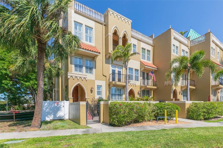 Experience luxury island living in this stunning 4-story gated townhome estate located in highly sought-after Davis Islands. With its commanding and modern Mediterranean architecture, the home features 3 bedrooms each with its own ensuite, an additional stylish half bath, private courtyard and breezeway, 2 car garage, and a private elevator to all floors including the rooftop providing incredible views of the marina, water, and our incredible sunsets. The raised elevation and blocked construction provides peace of mind during inclement weather as evidenced by no damage and/or water intrusion experienced. Located on a quiet street off the main boulevard, it is a pleasant walk to dining, shopping, entertainment, parks, marina, and all that makes the Islands truly unique.  The private courtyard welcomes you and leads to the home that has a first floor bedroom suite - perfect for an office, guest/mother-in-law suite.  On the second level is the chef-inspired kitchen with upgraded appliances, quartz counters, wood cabinetry, a sprawling island perfect for culinary creations. The kitchen is open to the Great Room with French doors that open to a balcony with great views.  A stylish powder room is also on the floor.  Plantation Shutters adorn the windows.  The primary bedroom suite is located on the third level with its own private balcony, dual walk-in closets, and large ensuite with separate frameless shower, water closet, and soaking tub.  On the other side of the floor is the laundry closet that provides for full size front loading appliances, and a third bedroom suite. Take the elevator to the rooftop for an experience all it's own.  Living larger awaits with a home highlighting both luxury and lifestyle.  Private showings available for qualified buyers. (Limited photos to preserve privacy).