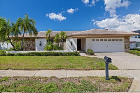 Photo of 3104 Bluffs Drive, Largo, FL 33770 (MLS # TB8551212)