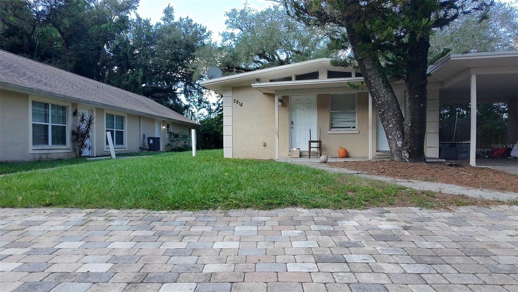 Photo of 2818 Locicero Drive, Tampa, FL 33619 (MLS # TB8562671)