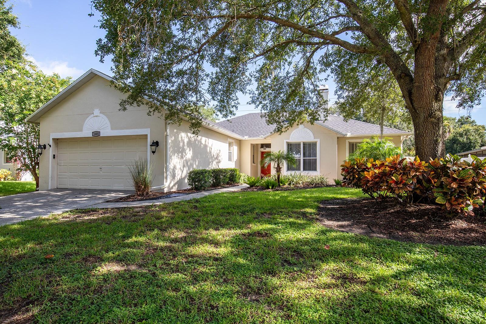 Wonderful 3/2 home WITH OFFICE that offers Open & Split floorplan w/ newer wood floors in Errol Estates! New roof in 2004 and Family room w/ 2 double sliders leading out to 17 x 13 screen covered porch. Piped for wet bar. Overlooking a beautifully landscaped backyard. Restful livingroom with fireplace. Very spacious master bedroom and bath with garden tub and separate shower stall. Two car Over sized garage with area perfect for workshop. LAWN SERVICE IS INCLUDED TOO! The landlords are having some painting done on the interior also.
