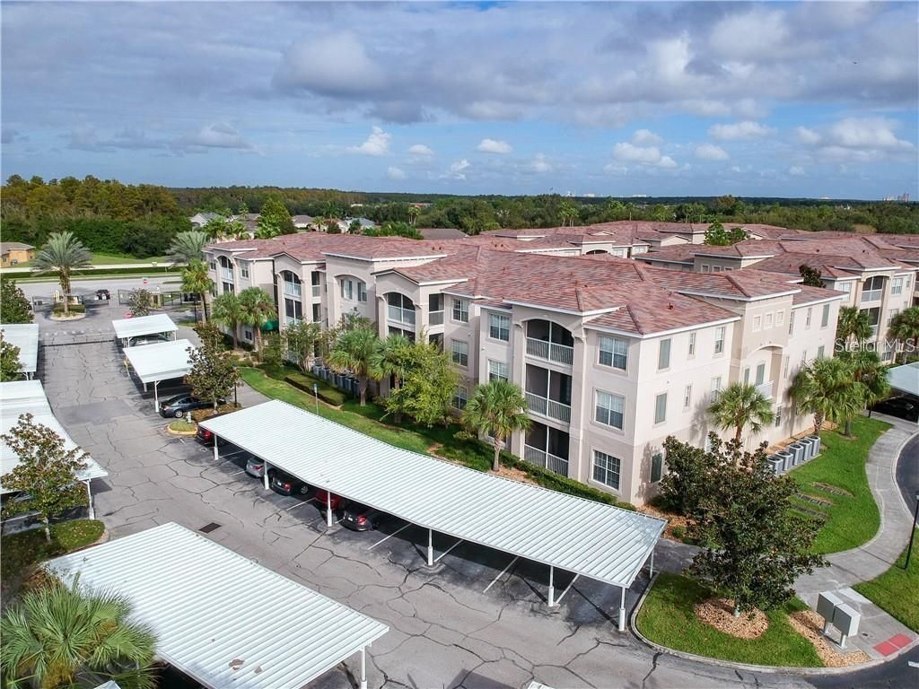 Photo of 3301 Whitestone Circle #107, Kissimmee, FL 34741 (MLS # S5135945)