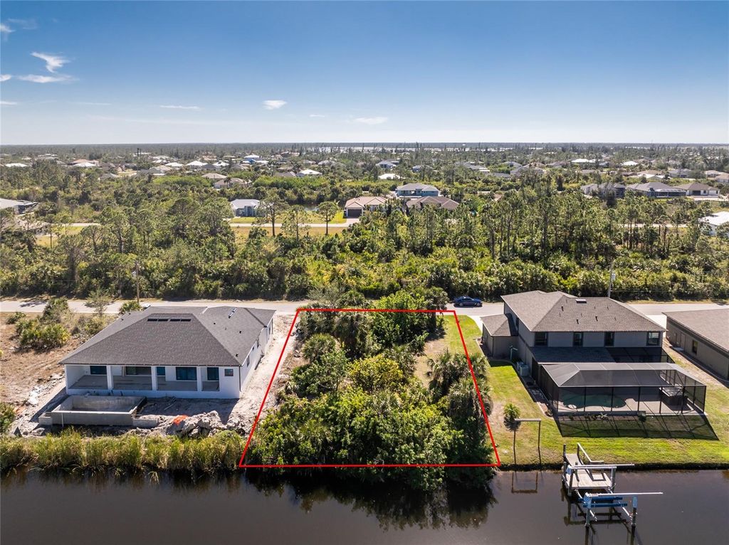 Photo of 15056 Hennipen Circle, Port Charlotte, FL 33981 (MLS # D6144090)