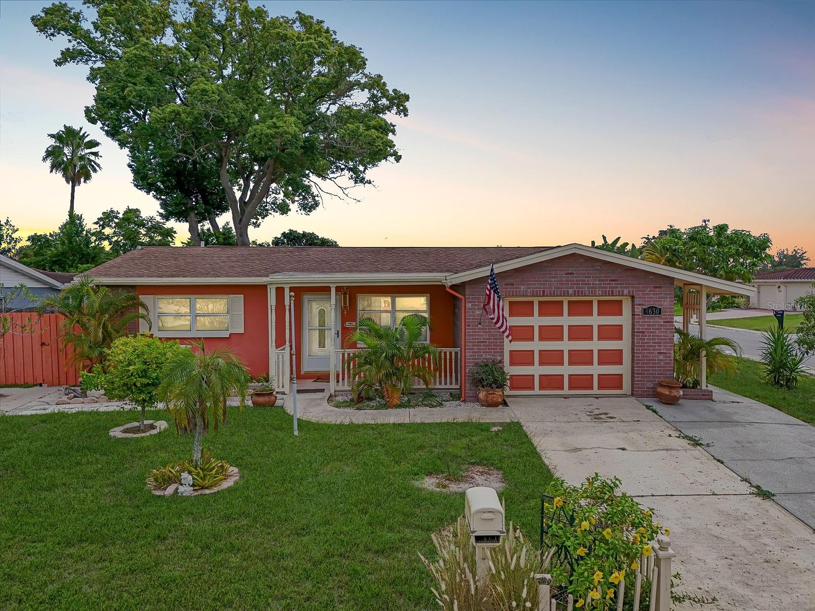 One or more photo(s) has been virtually staged. Welcome to this beautifully maintained Port Richey home that blends comfort, charm, and convenience. Nestled on a desirable corner lot, this property offers wonderful curb appeal and the rare bonus of two driveways, providing ample parking and flexibility for homeowners and guests alike. The neighborhood is known for its quiet setting and friendly atmosphere, and with no HOA restrictions, you’ll have the freedom to enjoy your property without added rules or fees.
As you step inside, you’ll appreciate the thoughtful details that make this home both practical and inviting. Tile flooring runs throughout the home, offering durability, easy maintenance, and a clean, modern look. The home also features a new water heater, ensuring efficiency and peace of mind for years to come. Natural light filters into the living spaces, creating an open and airy feel, while the layout flows comfortably to suit both everyday living and entertaining.
Outdoors, the property continues to shine with features that set it apart. A mature fruit tree adds a touch of charm, while the shed in the backyard provides valuable additional storage space. The lot itself feels private and spacious, yet it is ideally located close to stores, restaurants, and other conveniences, offering the best of both worlds.
This home is perfectly positioned in a great neighborhood, making it an excellent opportunity for anyone seeking a balance of comfort and convenience. Whether you’re relaxing in the quiet setting, enjoying the ease of nearby amenities, or taking advantage of the thoughtful updates, this Port Richey home is ready to welcome its next owner.