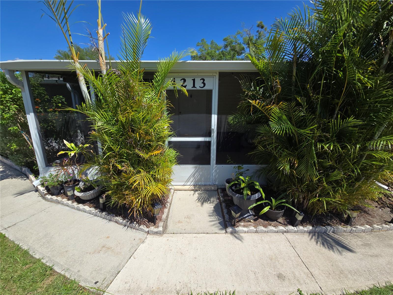 Charming Ground-Level One-Bedroom Condo in the Heart of Conway – No Upstairs Units! Discover this one-story, ground-level condo in a prime Orlando location. Set within a gate-controlled access community just minutes from Downtown Orlando, this residence combines comfort, privacy, and convenience. The interior features a bright, open layout with cool tile floors throughout and a ductless side-split air conditioning system for year-round climate control. With no units above, enjoy added peace in a quiet, well-kept setting. A spacious screened-in front porch provides a perfect spot for relaxing or spending time with guests. A dedicated parking space adds to the ease of living here. Located in the Conway area, this home is close to dining, shopping, parks, and major routes including the East-West Expressway (SR-408), Beachline (SR-528), and I-4. Travel, work, or recreation are all just minutes away. This condo may also be leased, providing flexibility for future use. Ideal for first-time buyers or those seeking a simplified lifestyle in a well-situated Orlando neighborhood. Explore this rare opportunity — it could be the perfect fit for your needs!