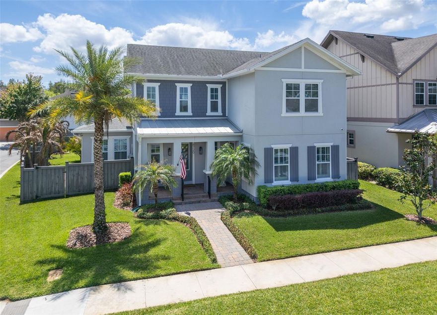 Welcome to luxury living in Laureate Park, Lake Nona’s most desired community! This stunning corner lot, estate home is an architectural masterpiece, 5 bedrooms, 4.5 bathrooms, and a delightful apartment over the garage. Prepare to be captivated by the sheer elegance and impeccable craftsmanship found throughout this residence. As you step inside, you'll notice that the open concept design seamlessly connects the living, dining, and kitchen areas, creating a harmonious flow for both everyday living and entertaining on a grand scale. The expansive windows and high ceilings allow natural light to fill the heart of the home accentuating the custom 2 story accent wall and many other hand-crafted, custom-built features throughout. The gourmet kitchen is a chef’s dream, featuring top-of-the-line stainless appliances, custom cabinetry, a large center island, and exquisite quartz countertops. On the main floor is also the private luxurious owner’s suite, complete with a spacious custom-designed walk-in closet and a spa-like ensuite bathroom adorned with dual vanities and an oversized glass-enclosed shower. There’s a flex room that can be used as an office, playroom or 6th bedroom. Upstairs, you'll discover 3 additional bedrooms, 2 full bathrooms, and a spacious loft. Another highlight of this extraordinary property is the 1-bedroom apartment situated above the garage. With its own private entrance, a full kitchenette, and a separate bathroom, this versatile space is perfect for accommodating guests, in-laws, or even transforming it into a home office or investment property. Step outside into your own personal oasis where you have an extended covered lanai and outdoor living area that’s surrounded by a beautifully landscaped private backyard that is the perfect place to enjoy Florida’s outdoor lifestyle. In total, this home boasts over $150K in custom upgrades! Lastly, the 3-car garage is complete with an overhead storage system, that provides additional space to store a golf cart or more toys! As a resident of Laureate Park, you'll enjoy access to a wide range of amenities, including resort style pools, parks, playgrounds, fitness center, tennis and walking trails. Additionally, you'll be moments away from highly-rated schools, shopping and dining destinations like Canvas Restaurant and the Wave Hotel, as well as Lake Nona Medical City, KPMG headquarters, USTA National Campus, and the NEW Lake Nona West shopping district.