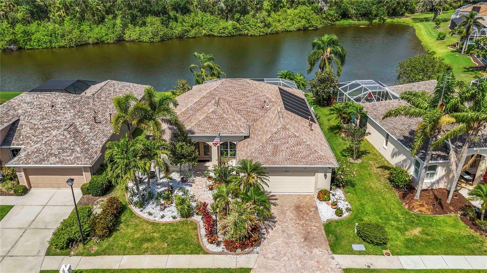 Stunning Lakefront Pool Home in Greenfield Plantation – Packed with Upgrades & Ready to Impress!CHOICE HOME WARRANTY IS TRANSFERABLE THROUGH 2030 GIVING YOU EVEN MORE CONFIDENCE! NEW ROOF 2020, SOLAR PANELS PAID OFF AND SO MUCH MORE!!
Step inside and be wowed by CUSTOM TRANSOM WINDOWS all windows and sliding doors replaced with new up to date Hurricane protection. ELEGANT CROWN MOLDING throughout, and laminated wood flooring that adds warmth and style. The new porcelain kitchen floors, marble bathroom floor, granite countertops, and plantation shutters in the dining room and primary bath elevate the home's interior charm. The kitchen is built to inspire, while the spacious extra-wide garage offers plenty of room for storage or a workshop.
Enjoy the flexibility of a Murphy bed in the second bedroom, perfect for guests or a home office. This home is made for comfort and peace of mind, again featuring a new roof (2020), attic radiant barrier, alarm system with cameras, AC with regular maintenance and no issues.
Outdoor living is what Florida is all about — and this home delivers. Relax in your private pool and jacuzzi, with a new gas heater and roller pool cover, all overlooking serene lake views. Safety is covered too, with a hurricane-rated garage door, hurricane shutters on side garage door/windows, and a roll-down front door shutter. Plus, solar panels are fully paid off, giving you energy efficiency and long-term savings.
Whether you're entertaining, relaxing, or working from home, this property offers the perfect blend of style, security, and convenience — LOW HOA FEES with no CDD fees and top-rated schools nearby.
Close to beaches, shopping, restaurants, and more
Move-in ready with premium features
Ideal for full-time living, vacation home, or investment
Don’t miss your chance to own a true Florida gem in Greenfield Plantation!