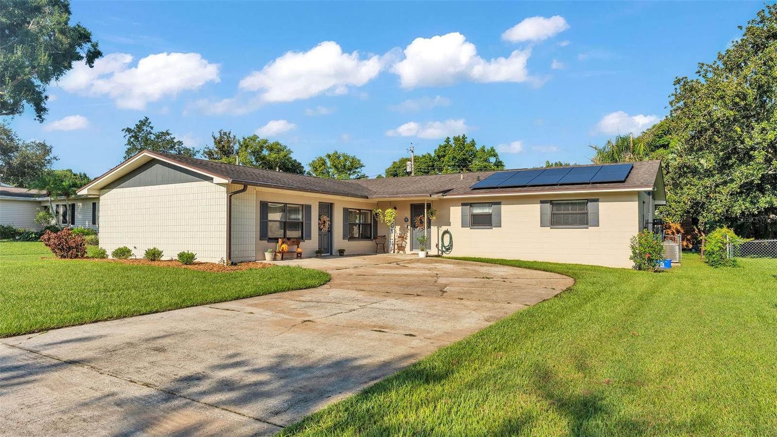 Nestled in a quiet, well-established neighborhood in South Lakeland, 4821 S Gachet Blvd beautifully combines comfort, functionality, and the advantages of a highly convenient location. This 3-bedroom, 2-bathroom residence offers an impressive 1,963 square feet of living space set on a generous 0.23-acre lot—with the added bonus of no HOA restrictions. The property’s placement is ideal for those who value accessibility, sitting just minutes from the Polk Parkway for quick commutes to both Tampa and Orlando. Families will appreciate being just down the road from Highlands Grove Elementary, while future growth in the area, including the new Orlando Health Lakeland campus scheduled to open in 2026, enhances both the convenience and long-term value of this prime location. Step inside and you’ll discover a versatile floor plan with two separate living areas designed to meet a variety of needs. The spacious front living room offers a welcoming area for gatherings, while the oversized flex space can adapt seamlessly into a home office, playroom, media room, or even a potential fourth bedroom—making this home a perfect fit for evolving lifestyles. At the heart of the home sits the expansive kitchen, offering abundant counter space and cabinetry, a layout that is ideal for both daily meals and entertaining guests. The open design flows into the dining area and beyond, creating a warm and inviting atmosphere. From the main living area, French doors open to a screened lanai, providing the perfect spot to enjoy morning coffee, evening relaxation, or entertaining friends. The lanai overlooks the large, fenced backyard—a private outdoor retreat with plenty of room for gardening, pets, or even a future pool to create your own backyard oasis. Practical updates and energy efficiency are already built into this property. A robust 5-ton air conditioning system was installed in 2020, ensuring reliable year-round comfort. Additionally, the home features a fully paid-off solar panel system installed in 2023, allowing the next homeowner to enjoy significantly reduced utility bills from the very first day. These valuable upgrades add both peace of mind and long-term savings. The exterior of the property is equally accommodating, with an extra-large driveway that provides ample parking for multiple vehicles, guests, or even recreational equipment such as boats or RVs—an added bonus for families who need space for all their toys and activities. With its flexible floor plan, modern updates, and unbeatable location near schools, shopping, healthcare, dining, and major highways, this South Lakeland home represents an incredible opportunity to enjoy both comfort and convenience. Whether you’re seeking room to grow, an energy-efficient lifestyle, or proximity to all that Central Florida has to offer, 4821 S Gachet Blvd checks every box. Schedule your private showing today and experience firsthand the space, upgrades, and welcoming atmosphere this home has to offer—you may find yourself never wanting to leave. Schedule your tour today!