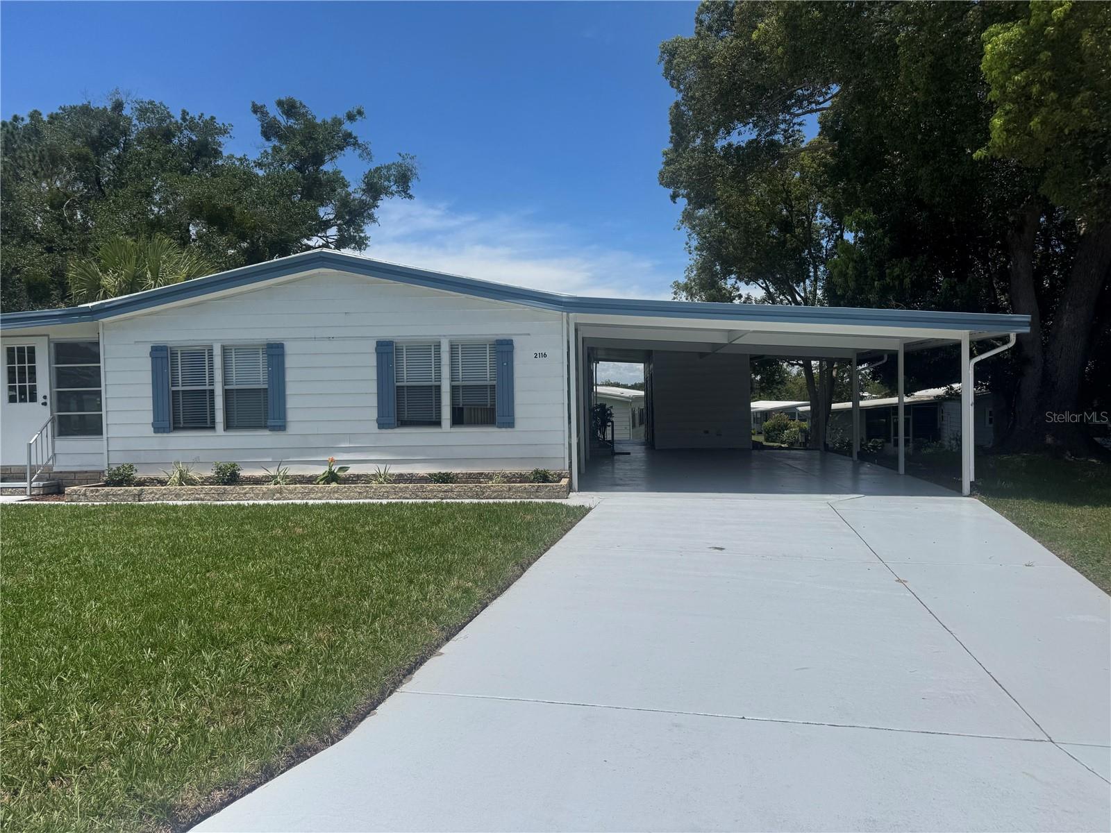 Welcome to 2116 Wax Myrtle Dr #1762 – Your Next Chapter Starts Here!
Discover the perfect combination of comfort, convenience, and community in this beautifully maintained 2-bedroom, 2-bath manufactured home located in the desirable Banbury Village section of Zellwood Station, one of Central Florida’s premier 55+ gated golf communities. Built in 1979, this spacious home offers 1,564 square feet of living space designed for both relaxation and entertaining.
As you step inside, you're greeted by a bright and airy layout with large windows that fill the home with natural light. The generous living and dining areas flow effortlessly into the functional kitchen, complete with ample cabinetry and counter space. The primary bedroom features an en-suite bathroom and a walk-in closet, while the secondary bedroom offers comfort for guests or can be used as a home office or hobby room.
Enjoy Florida’s beautiful weather year-round in the screened-in porch or relax in the shade of your covered carport. The home sits on a peaceful, well-kept lot within a vibrant, active community.
NEWER AC UNIT Installed on 08/2021