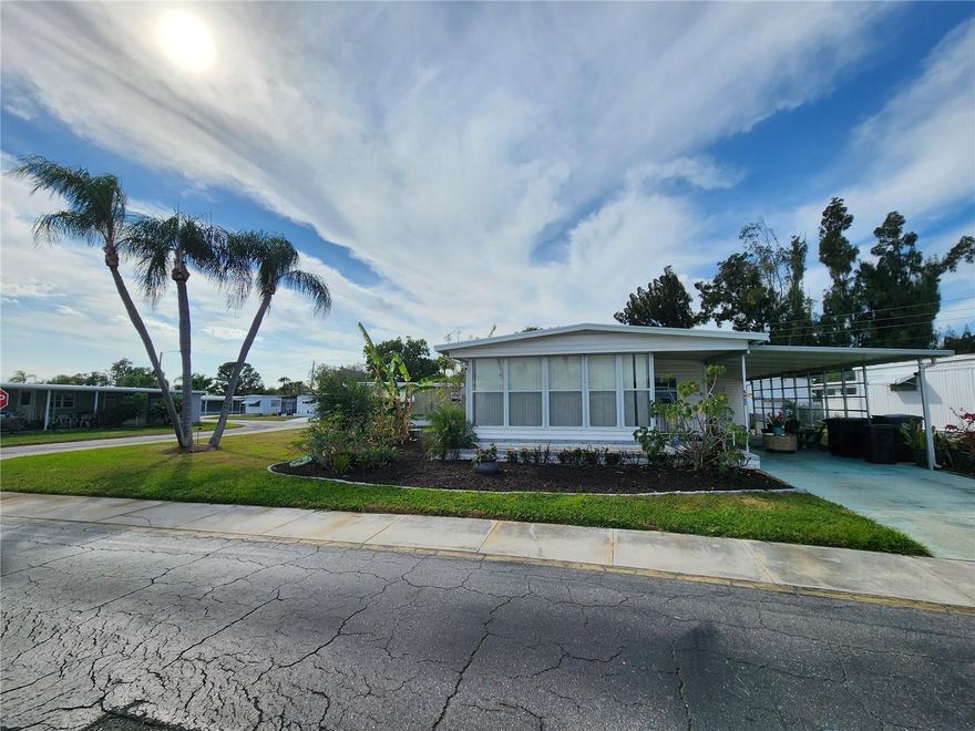 Polished and serene home on one of the largest corner lots in desirable Chateau Village. Lovingly maintained and reimagined space maximized by a professional designer in high-end materials.

spring 2025 – HVAC
Fall 2024 - original metal roof seams and fittings sealed
summer 2024 – kitchen
early 2024 - electric box and tankless water heater
fall 2023 – bathroom

mature, self-sustaining garden filled with pollinator-friendly native plants and trees, freshly covered in 4+ inches of mulch

5/8” plywood under luxury vinyl floor, cement board in kitchen and bath
new windows over 2018-2025
lanai windows and blinds prior to 2017

bathroom amenities: ceramic tile floor and shower, dual rainfall and 8” spray heads, Japanese soaking tub with custom tile backdrop and waterfall/spray faucet, vessel sink on a quartzite top, and large lighted mirror

kitchen details: leather-finish granite counter-top, two-tone solid wood cabinets, blackstainless undermount sink, brushed gold hardware and gourmet faucet, Samsung WIFI range, low-profile GE microwave, ceramic tile backsplash

original photography on canvas in the kitchen and living room

structural and cosmetic repairs from 2024 hurricane damage completed summer 2025