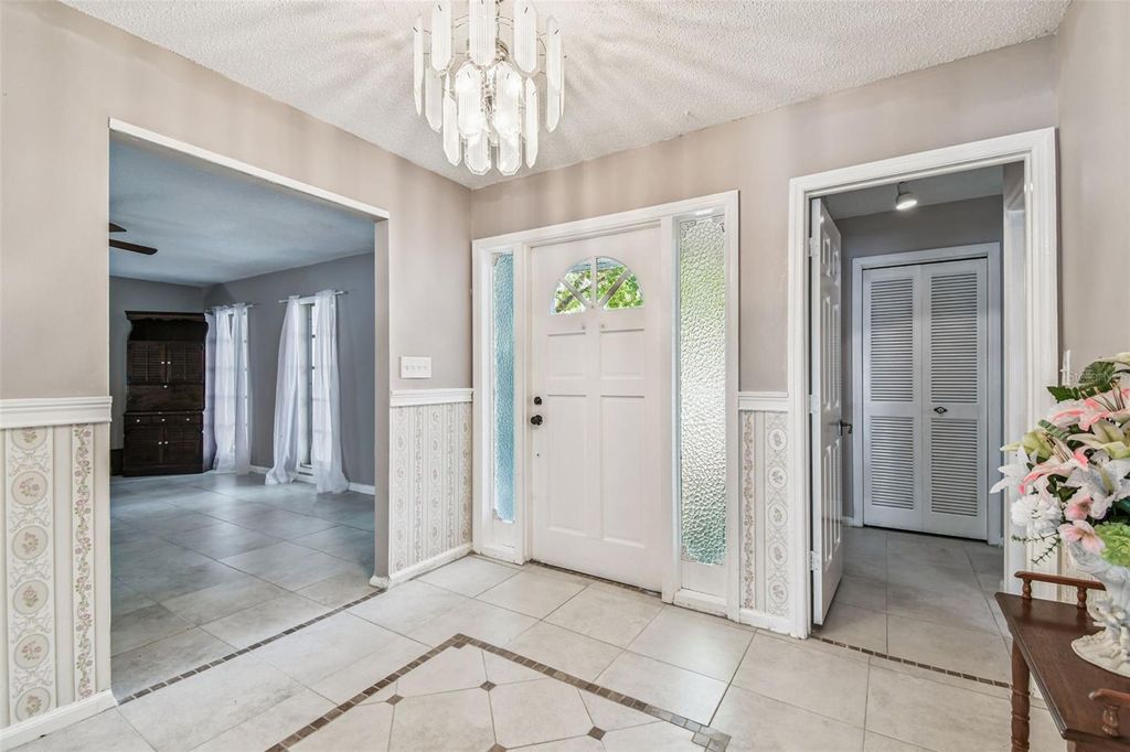 Photo of 9516 Merrimoor Boulevard, Seminole, FL 33777 (MLS # TB8419944)