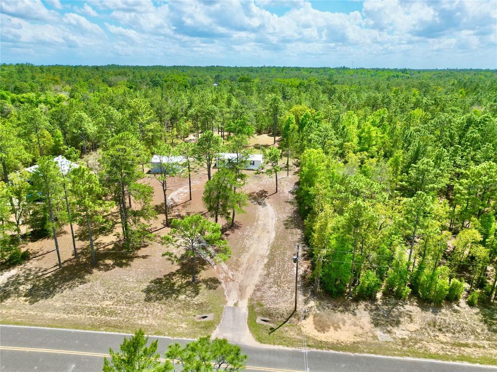 Photo of 175 Whirlwind Loop, Hawthorne, FL 32640 (MLS # GC539140)