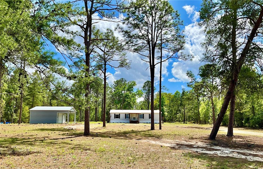 Photo of 175 Whirlwind Loop, Hawthorne, FL 32640 (MLS # GC539140)