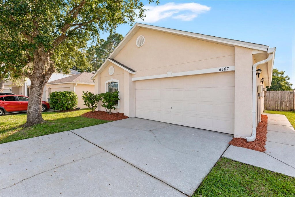 Photo of 6407 Tabogi Trail, Wesley Chapel, FL 33545 (MLS # O6445046)