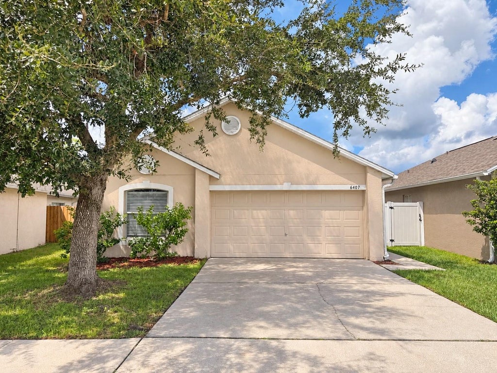 Photo of 6407 Tabogi Trail, Wesley Chapel, FL 33545 (MLS # O6445046)
