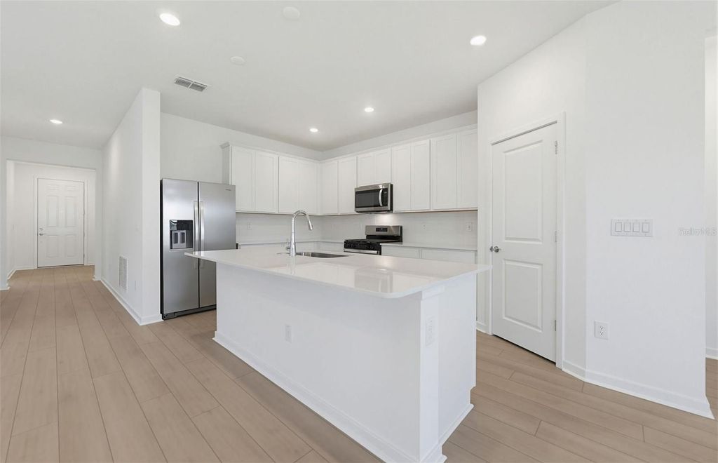 Photo of 33383 Herds Hallow Way, Wesley Chapel, FL 33545 (MLS # TB8489398)