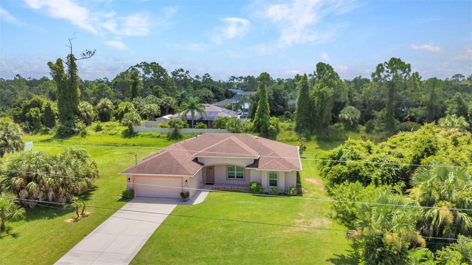 NORTH PORT - Welcome to this beautifully maintained 3-bedroom plus Den, 2-bath home in the heart of North Port, FL. This inviting residence offers a bright and open floor plan, perfect for both everyday living and entertaining. Step inside to find a spacious living area filled with natural light, a well-appointed kitchen with ample, updated cabinetry with pull outs, granite counter tops, matching appliances, and a comfortable dining space. The split-bedroom layout ensures privacy, with a generous primary suite featuring a walk-in closet and a private bath with a walk-in shower. Two additional bedrooms and a guest bath provide plenty of space for family and guests. The den can be used as an office, family room, craft room, 4th bedroom or whatever other space you need.
Outside, enjoy the Florida lifestyle with a nicely landscaped yard and a large covered patio with ceilings fans—ideal for relaxing or hosting gatherings. A nice shed is in the backyard for added storage. Also, you will surely love a neat and tidy 2 car garage complete with epoxy flooring. This home has been lovingly cared for and is exceptionally clean, offering peace of mind and move-in-ready convenience. VACANT LOTS ON EITHER SIDE OF THE HOME AVAILABLE FOR PURCHASE SEPATELY. GREAT OPPORTUNITY TO KEEP THE PRIVACY OF THIS HOME.
Located close to shopping, dining, schools, parks, and the beautiful Gulf beaches, this property combines comfort, style, and a great location.
Don’t miss your opportunity to make this well-maintained North Port gem your new home!