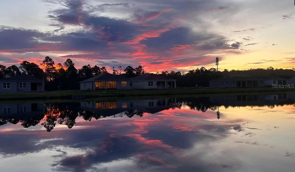 Photo of 6449 Shimmering Shores Lane, Saint Cloud, FL 34771 (MLS # O6386629)