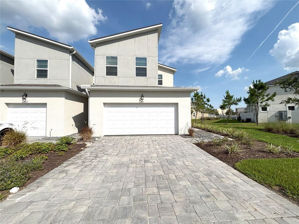 Photo of 921 Spring Palms Loop, Orlando, FL 32828 (MLS # S5136106)