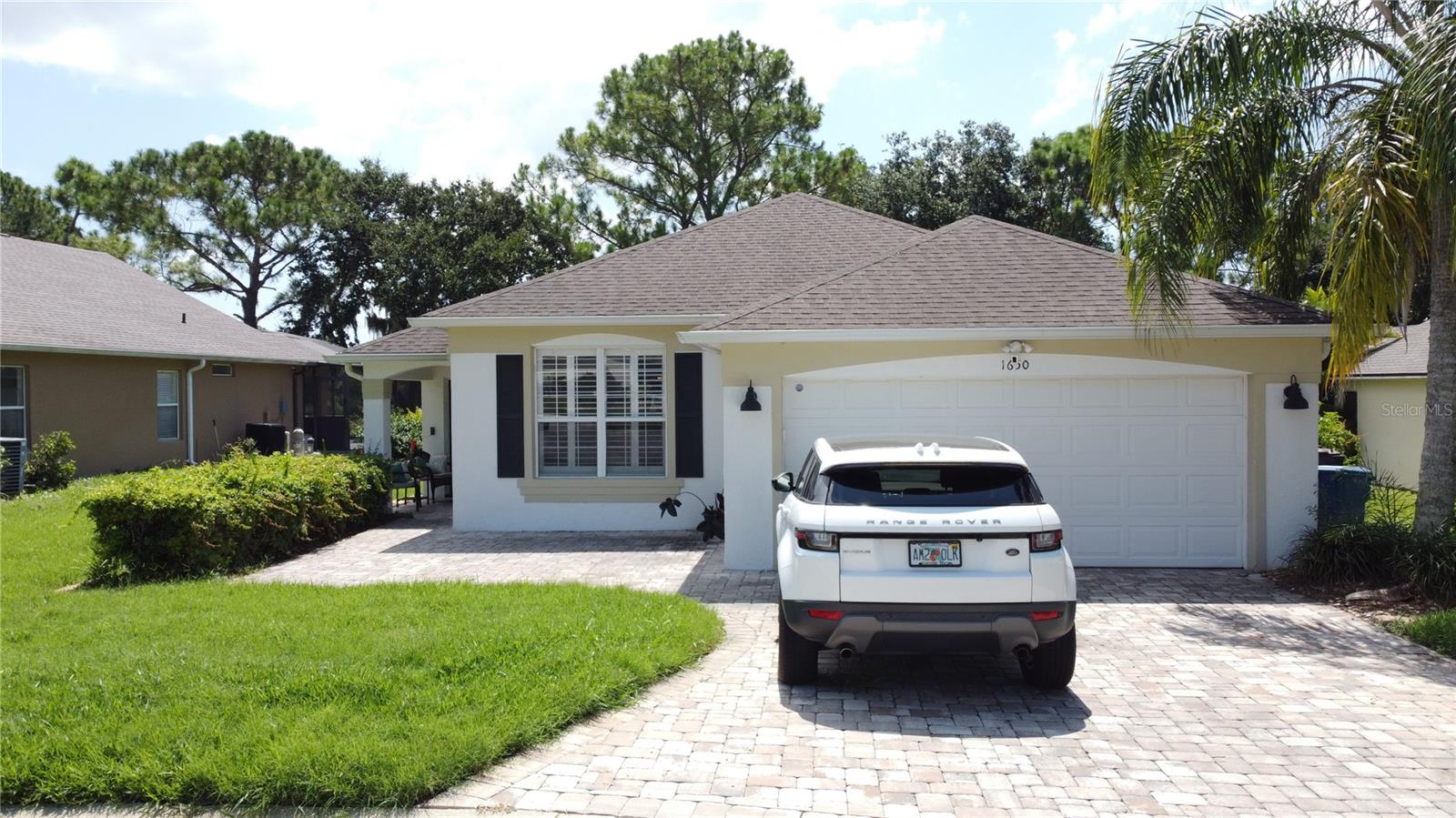 Stop the golf cart… this is the one! Simply stunning 4-bedroom, 3-bathroom pool home with breathtaking golf course views, ideally tucked away in a quiet cul-de-sac on the 12th fairway of the sought-after gated community of Southern Dunes Golf & Country Club. Offered furnished for convenience, whether you're searching for a primary residence, winter retreat, or income-producing vacation home, this beautifully updated property offers space, style, and scenery in equal measure.
As you drive up you will notice the paver driveway and mature landscaping. Step inside to a warm and elegant open-concept living space that flows effortlessly into the kitchen and dining areas — all overlooking the screened pool and lush fairway beyond. The heart of the home is the beautifully remodelled kitchen, featuring rich cherry cabinetry, a generous central island with gleaming granite counters, newer appliances, upgraded lighting, and an eye-catching backsplash. It’s the perfect place to gather, cook, and entertain Florida-style.
The desirable Laguna floor plan includes two en suite bedrooms at the front of the home, ideal for guests or multi-generational living, along with two additional bedrooms and a third full bath. Elegant window shutters and upgraded patio doors add to the sense of quality throughout. NO CARPET - Neutral tile throughout for easy maintenance.
Outside, the pool deck becomes your private oasis. Enjoy morning coffee under the lanai, soak up the sun on the spacious deck, or relax in the evening with a glass of wine while taking in the ever-changing views of the 12th fairway. With a covered sitting area, screened enclosure, and plenty of room to dine, lounge or even watch your favorite show on the TV, it’s a space you’ll love year-round.
Southern Dunes offers 24-hour security, a top-rated golf course, clubhouse, tennis courts, fitness center, and a newly added flood-lit driving range. Zoned for short-term rental and perfectly located near Posner Park, I-4, theme parks, medical facilities, and dining, this is Florida living at its best.
Don't miss this one-of-a-kind opportunity — schedule your private showing today.