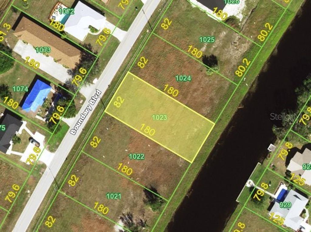 Photo of 308 Boundary Boulevard, Rotonda West, FL 33947 (MLS # D6143094)