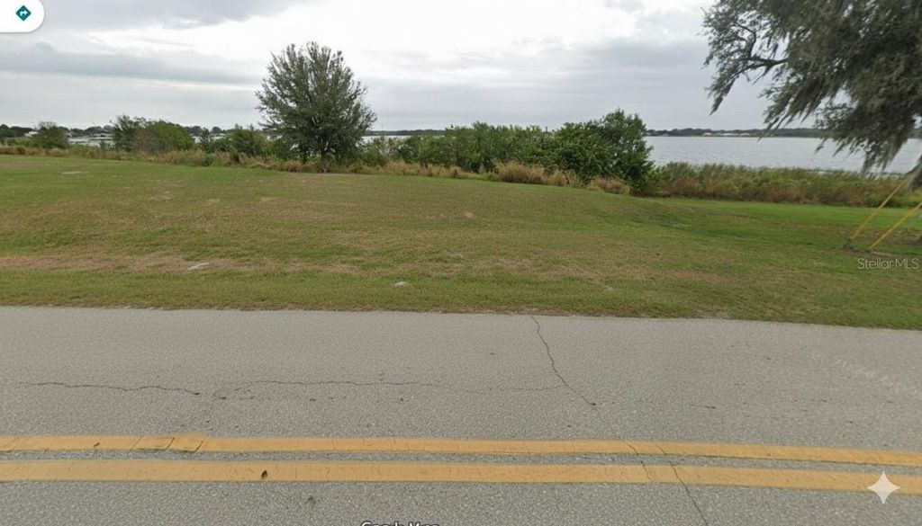 Photo of 1051 W Lake Damon Drive, Avon Park, FL 33825 (MLS # O6363204)