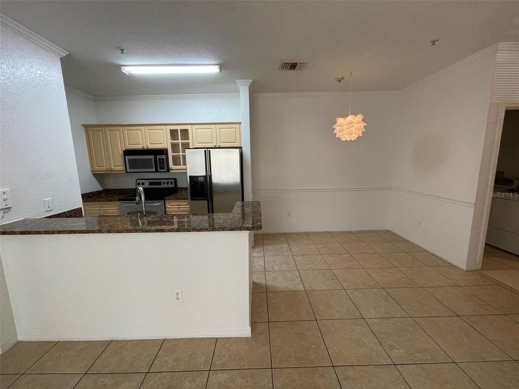 Photo of 3611 Conroy Road #825, Orlando, FL 32839 (MLS # S5149693)