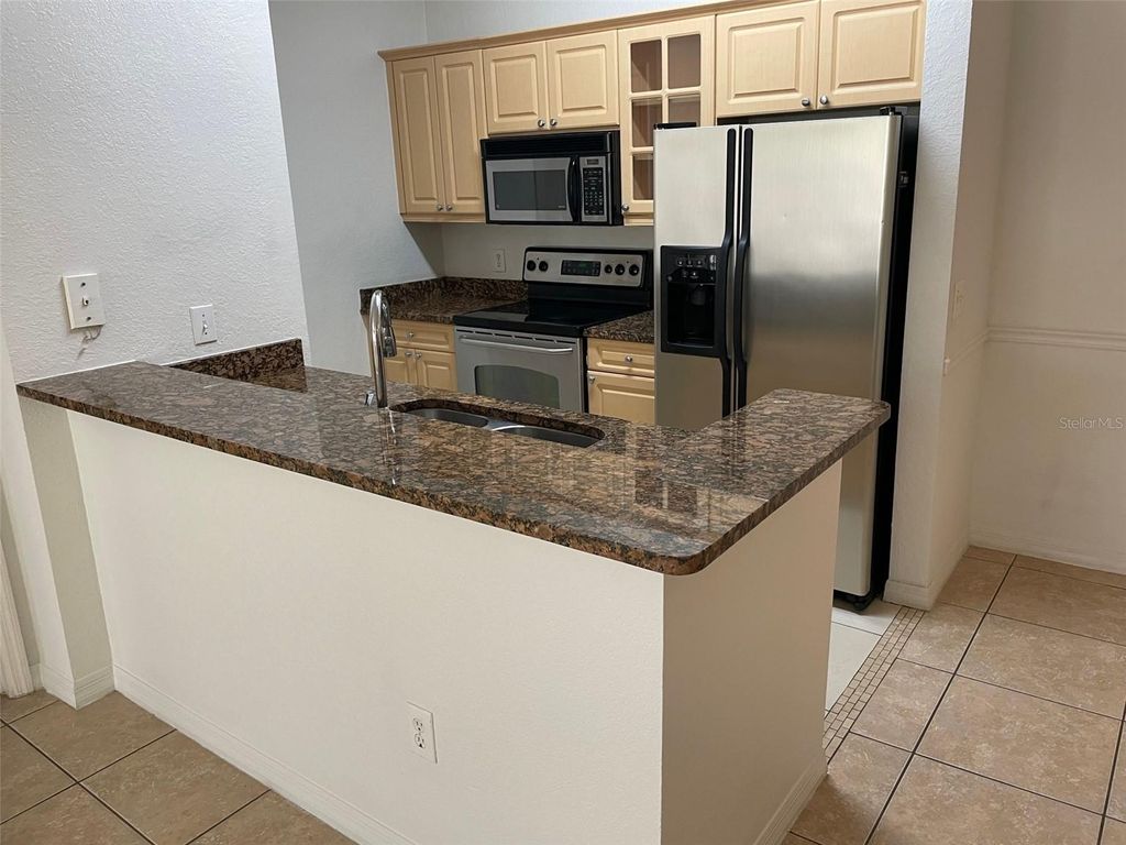 Photo of 3611 Conroy Road #825, Orlando, FL 32839 (MLS # S5149693)